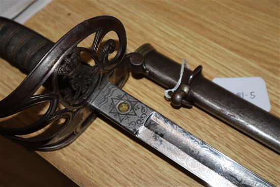 An E. Woods Officers dress sword presented by Serjt Major Mattham by his Comrades in Battery 4th F.A.V length 99cm